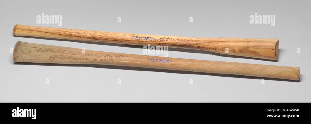 The wooden stick has printed type in blue ink that reads: [LESTER MADDOX'S / PICKRICK DRUMSTICK]. A note written to Media Access Project by hand in black ink is featured on one side of the object. Lester Garfield Maddox Sr. refused to serve Black customers in his Atlanta restaurant, the Pickrick, in violation of the Civil Rights Act of 1964. Nevertheless he served as the 75th Governor of the U.S. state of Georgia from 1967 to 1971. Stock Photo