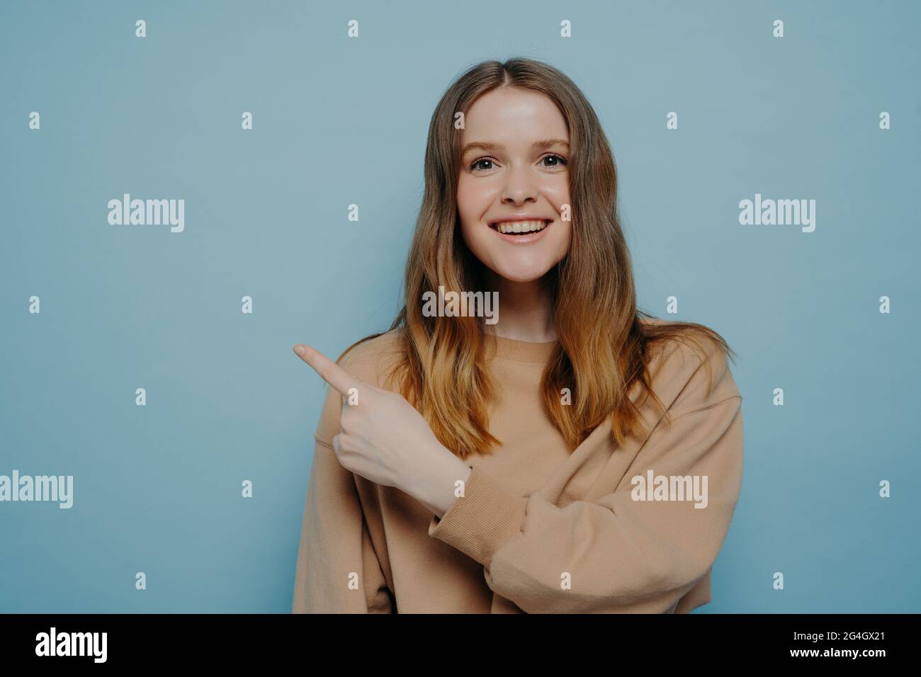 Woman pointing young girl hi-res stock photography and images - Alamy