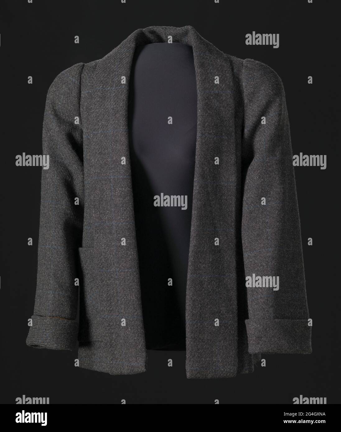 Grey wool tweed jacket designed by Arthur McGee. The jacket has an open