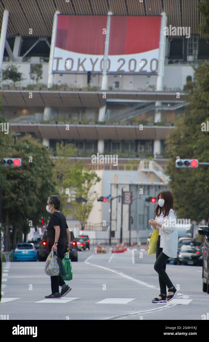 Tokyo, Japan. 21st June, 2021. People is seen walk outside of National Stadium in Tokyo, Japan on Monday, June 21, 2021. Photo by Keizo Mori/UPI Credit: UPI/Alamy Live News Stock Photo