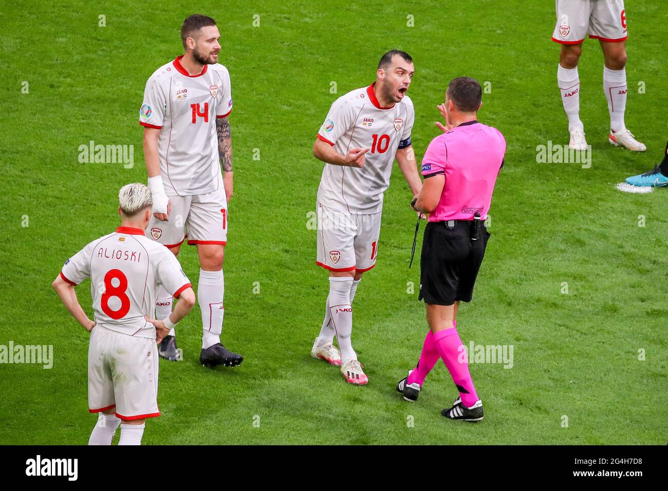 AMSTERDAM, NETHERLANDS - JUNE 21: Ezgjan Alioski of North Macedonia, Darko Velkovski of North Macedonia, Goran Pandev of North Macedonia, Referee Istvan Kovacs during the UEFA Euro 2020 Championship Group C match between North Macedonia National Team and Netherlands National Team at the Johan Cruijff ArenA on June 21, 2021 in Amsterdam, Netherlands (Photo by Marcel ter Bals/Orange Pictures) Credit: Orange Pics BV/Alamy Live News Stock Photo