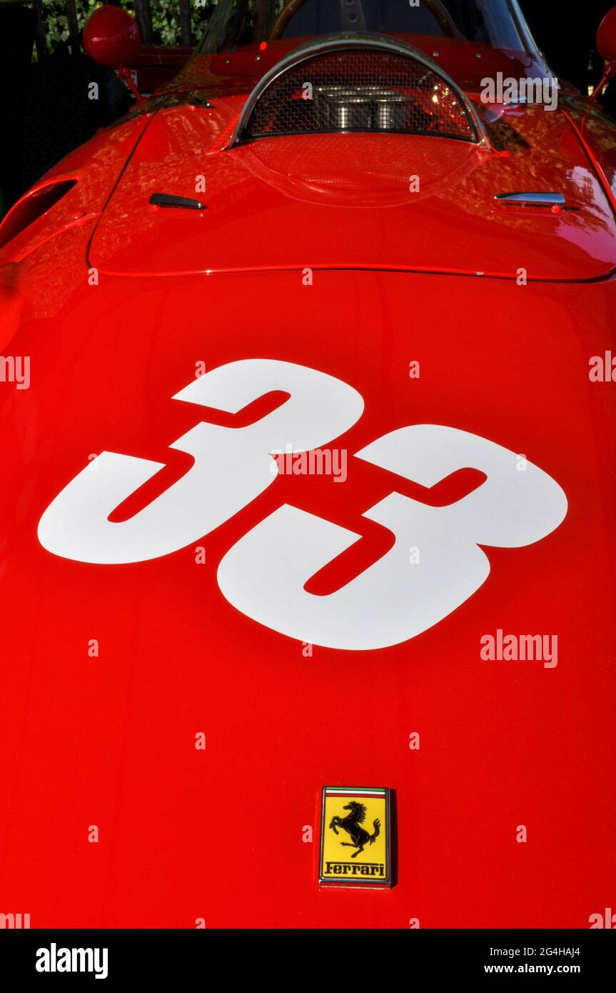 Classic red 1959 Ferrari 246 Dino racing car at the Goodwood Revival vintage event 2011, West Sussex, UK. Number 33. Raced in the Richmond Trophy Stock Photo