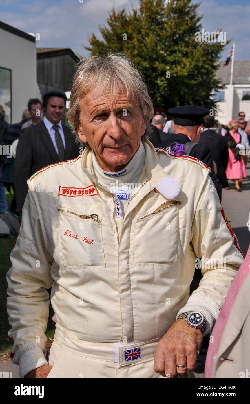 Derek Bell, racing driver in race overalls at the Goodwood Revival vintage  event, West Sussex, UK, preparing to race a classic car Stock Photo - Alamy