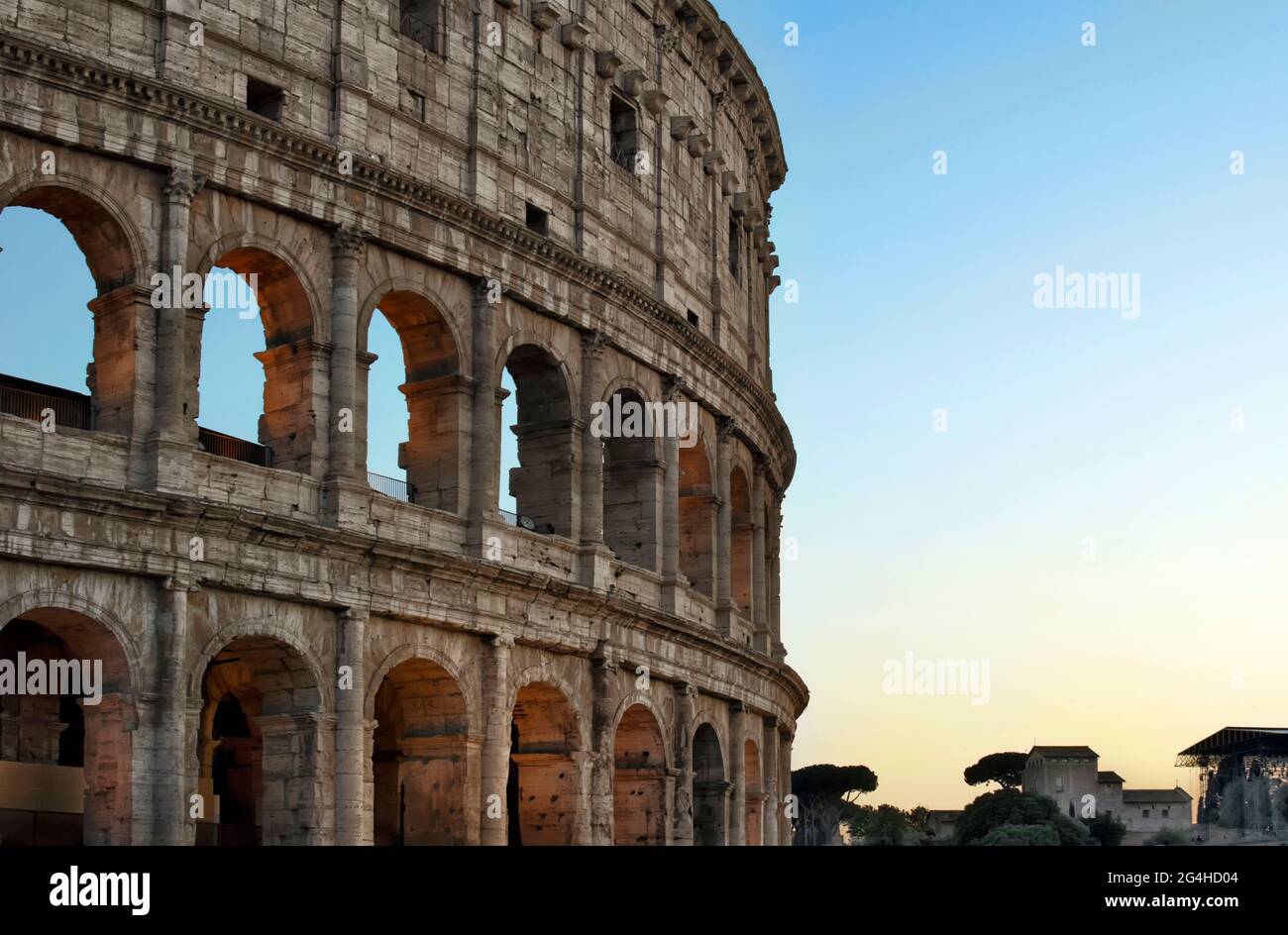 Colosseum in the evening. Rome, Italy, Europe. Rome ancient arena for gladiator fights. Stock Photo