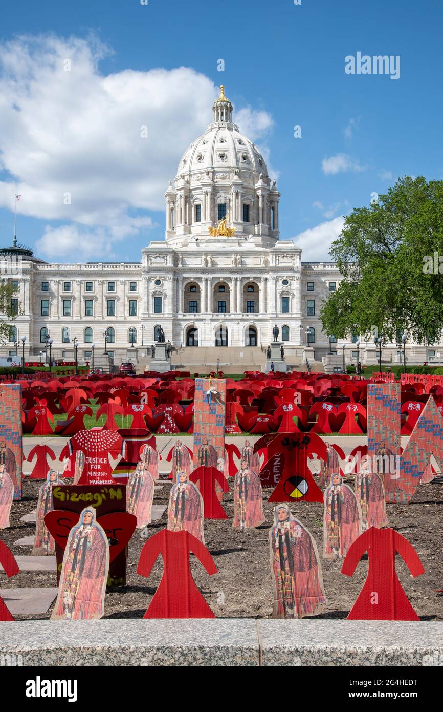 St. Paul, Minnesota. Memorial to the missing and murdered Indigenous women.  Thousands of cardboard red dresses were set out on the State Capitol lawn Stock Photo