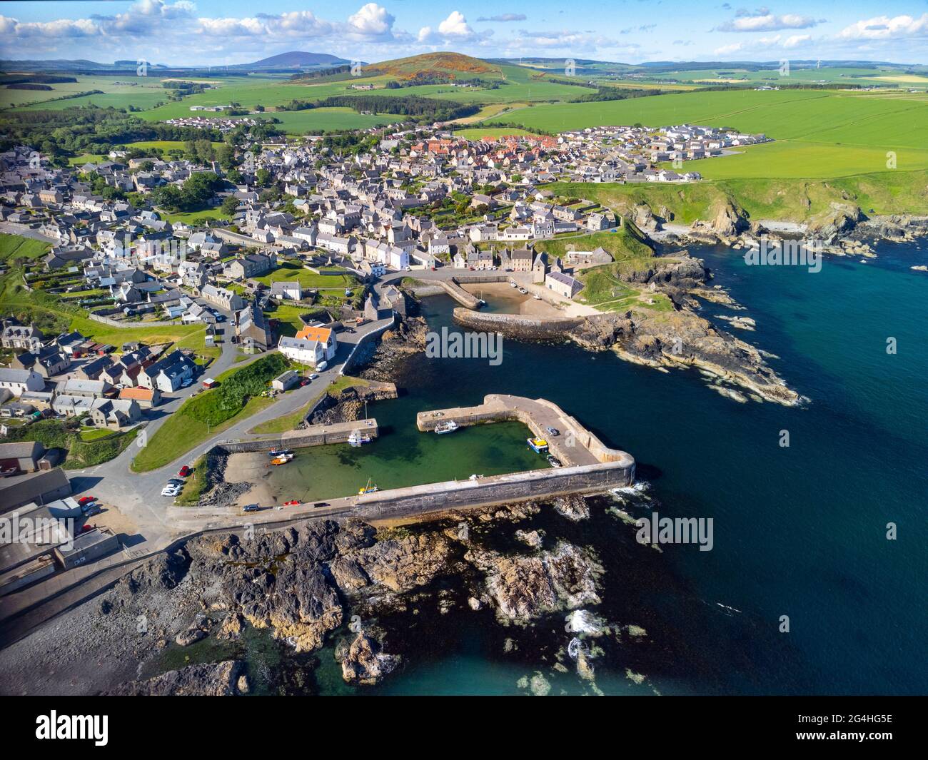 Aerial of historic harbours and village at Portsoy in Aberdeenshire on the Moray Firth, Scotland, UK Stock Photo