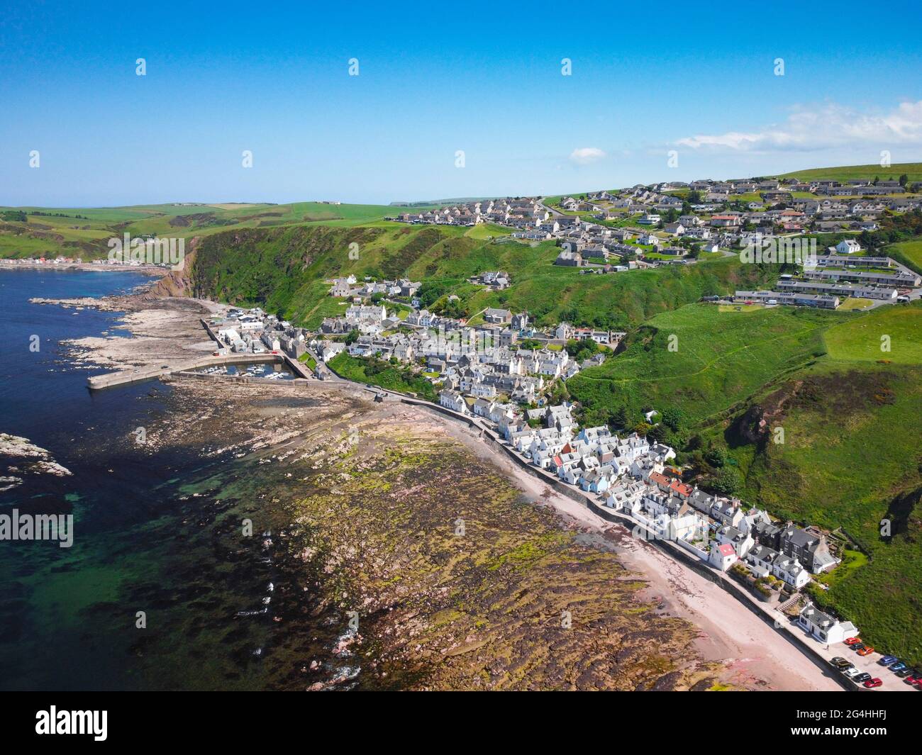 Aerial view from drone of  historic village of Gardenstown on Moray firth Coast in Aberdeenshire, Scotland, Uk Stock Photo