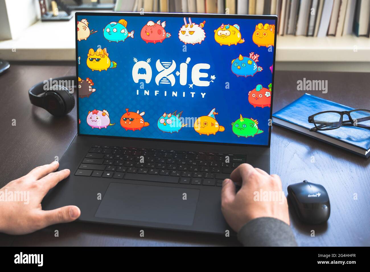 Russia Moscow 30.05.2021.Logo, screenshot of blockchain nft ethereum  cryptocurrency game Axie in laptop screen. Man playing, collecting,  creating cryp Stock Photo - Alamy