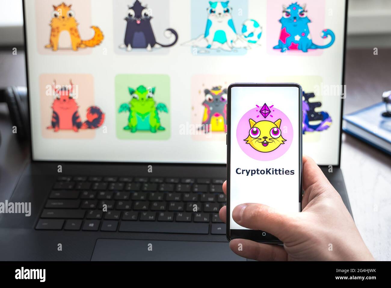 Russia Moscow 30.05.2021.Logo, screenshot of blockchain nft ethereum  cryptocurrency game Cryptokitties in laptop screen. Man playing, collecting  crypt Stock Photo - Alamy