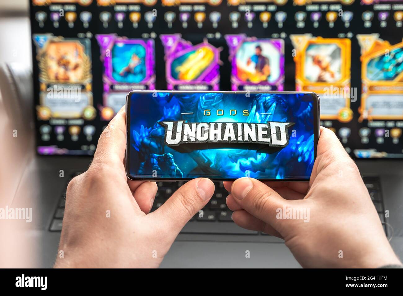 Russia Moscow 30.05.2021.Logo, screenshot of blockchain nft ethereum  cryptocurrency game Unchained gods in laptop.mobile phone. Man  playing,collecting Stock Photo - Alamy