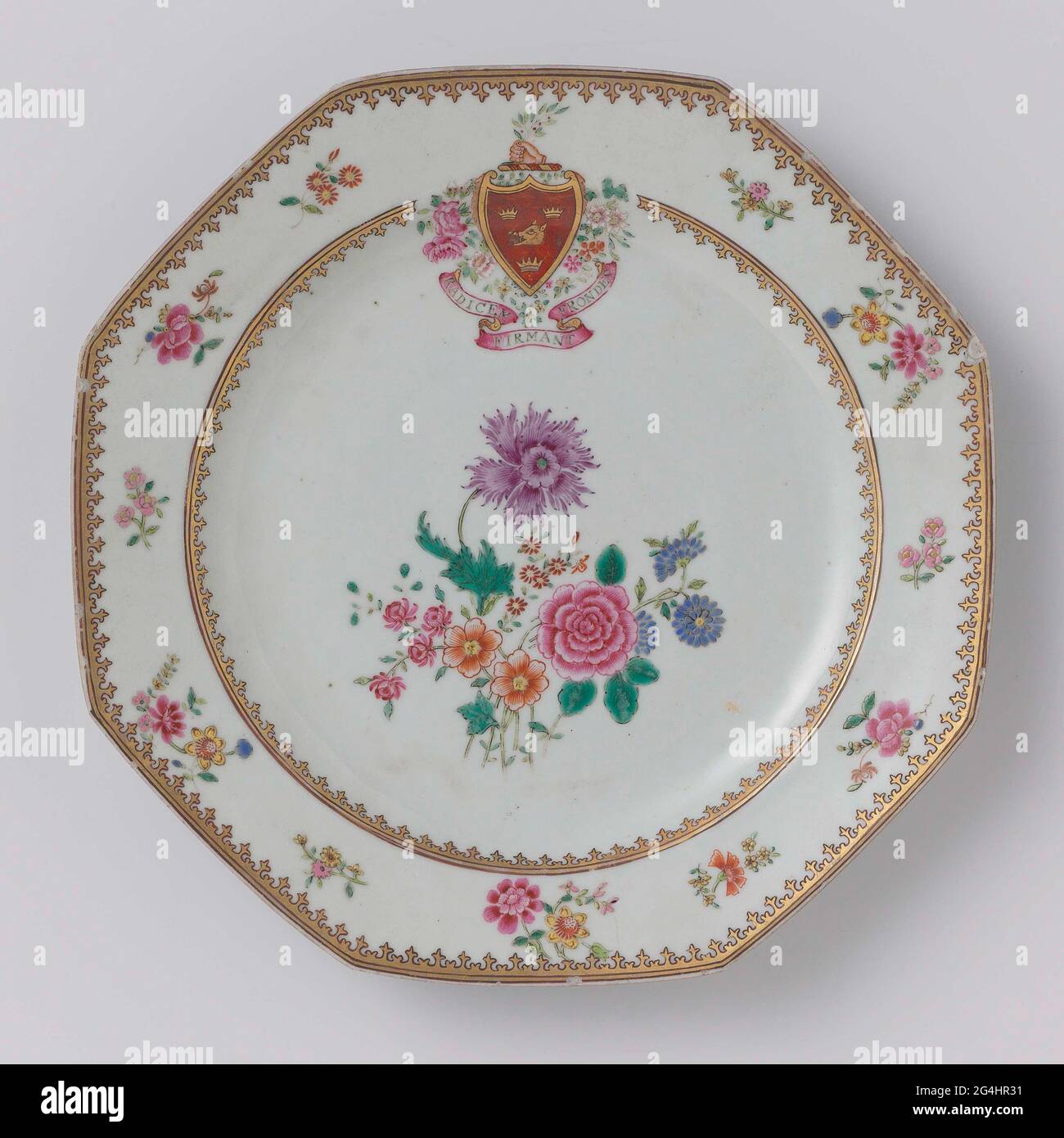 Octagonal plate of porcelain, painted on the glaze in blue, red, pink,  green, yellow, purple, black and gold. On the flat a group of blooming  plants; On the wall a Spearhead