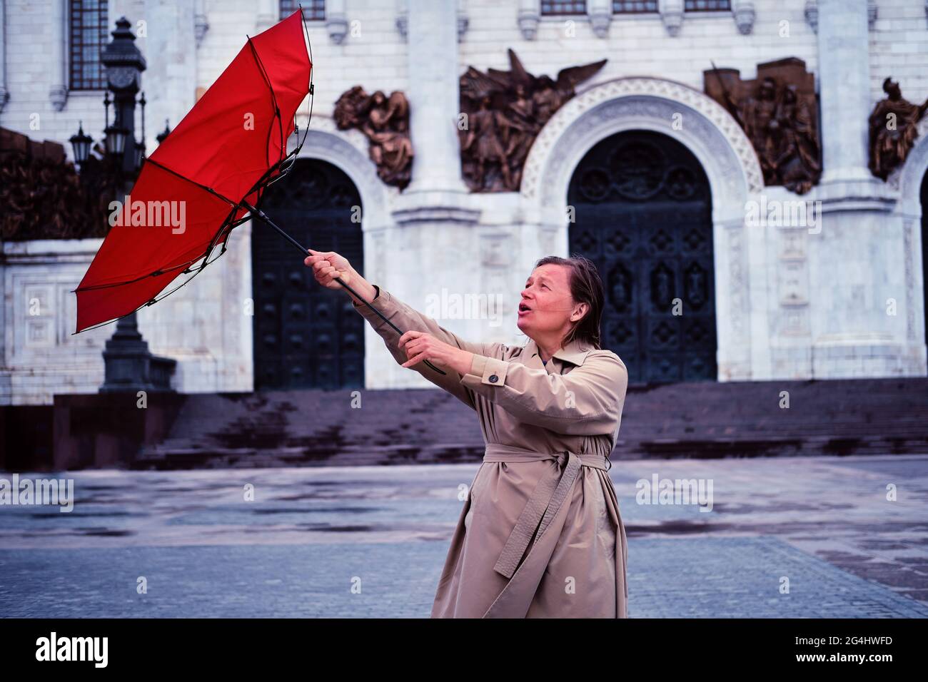 Strong wind umbrella woman hi-res stock photography and images - Alamy