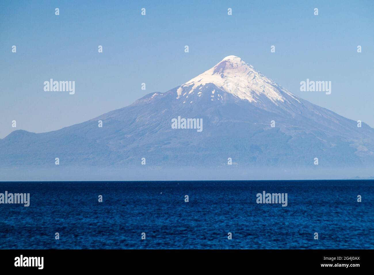 View of Osorno volcano over Llanquihue lake, Chile Stock Photo - Alamy