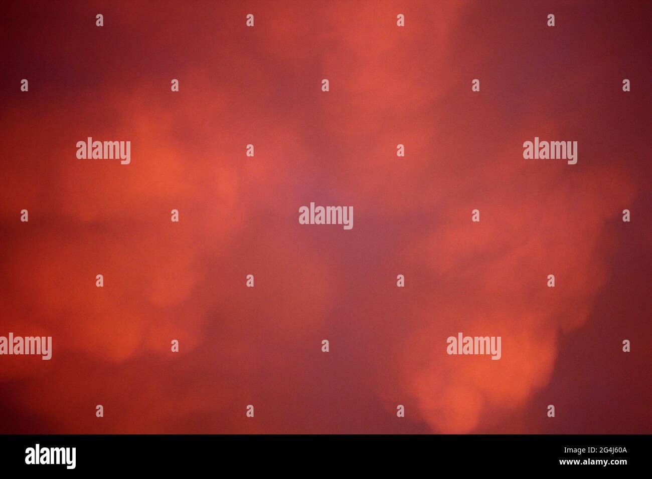 Fiery Sunset Sky with Clouds Stock Photo - Alamy