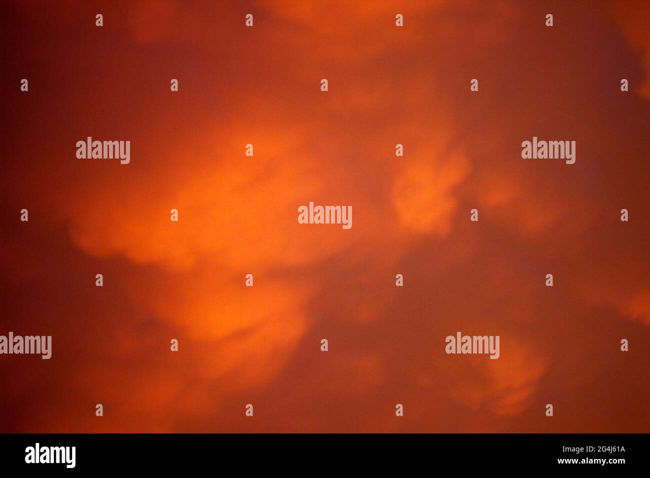 Fiery Sunset Sky with Clouds Stock Photo - Alamy