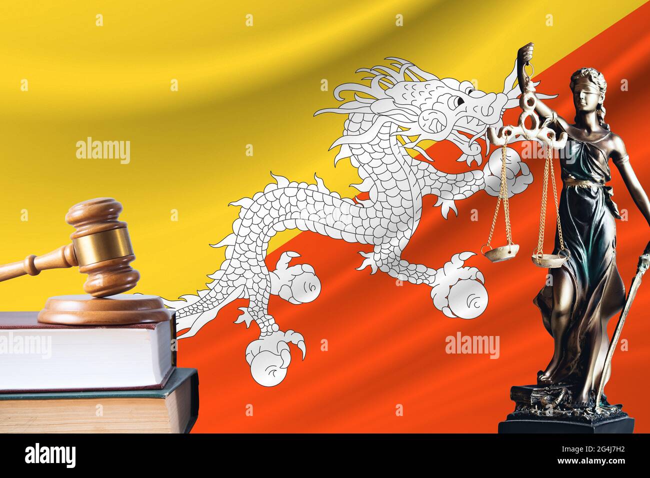 Law and justice in Butane. Statue of themis and the gavel of the judge
