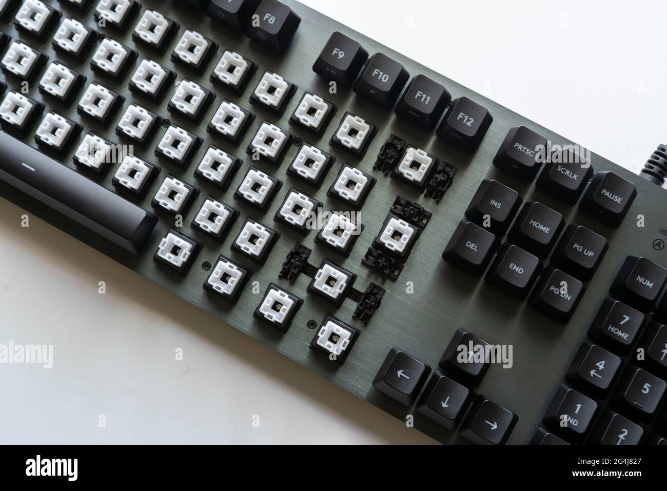 modern mechanical keyboard switches, black and white keycaps on the