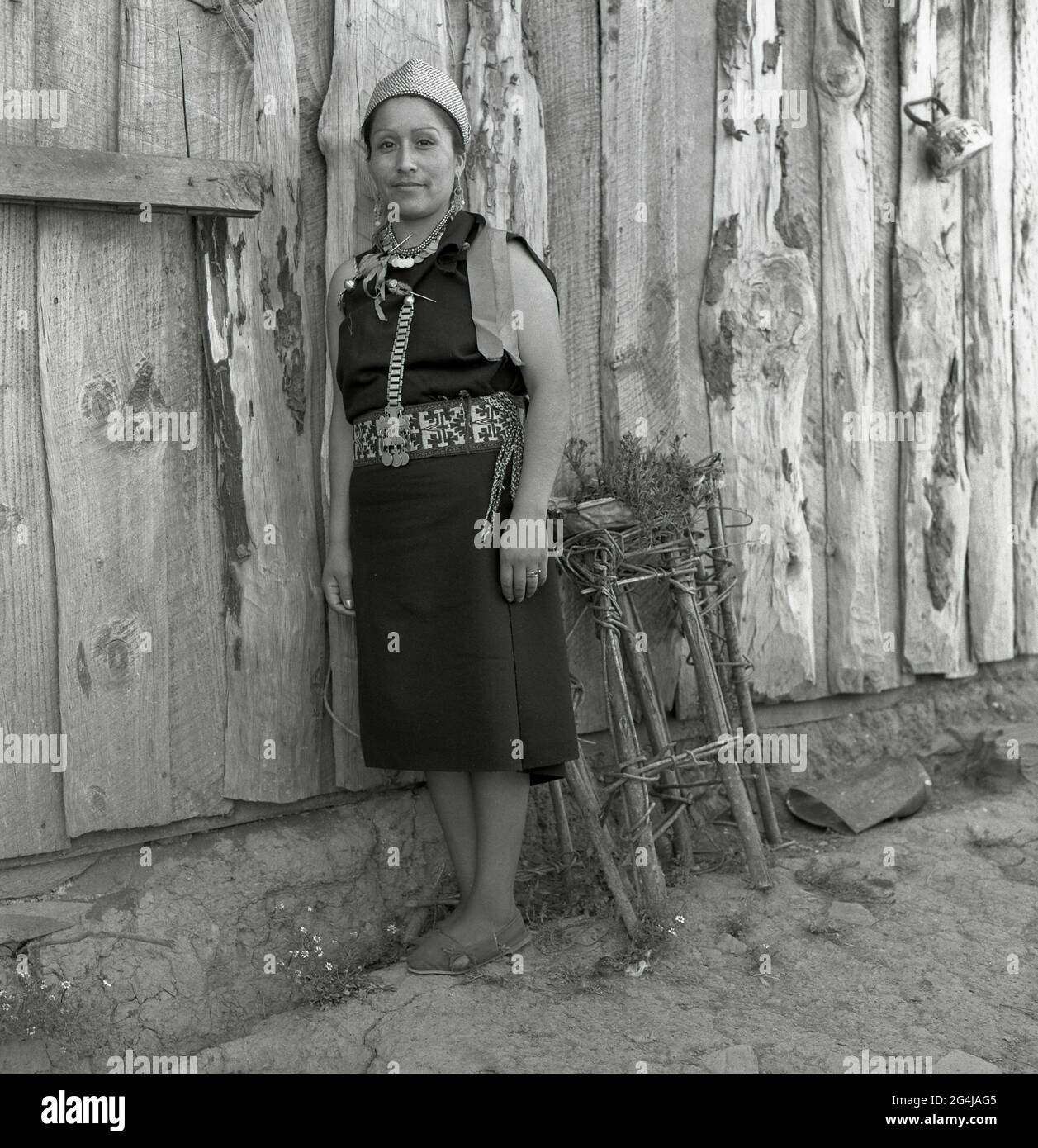 Portrait of young Mapuche women at her house in Lumaco-Chile Stock Photo