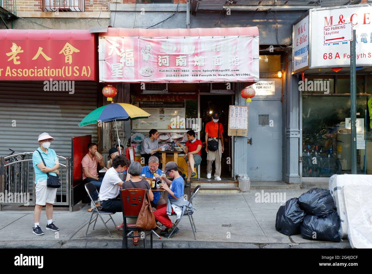 Spicy Village, 68 Forsyth St, New York, NYC storefront photo of a Henan restaurant in Manhattan Chinatown. Stock Photo