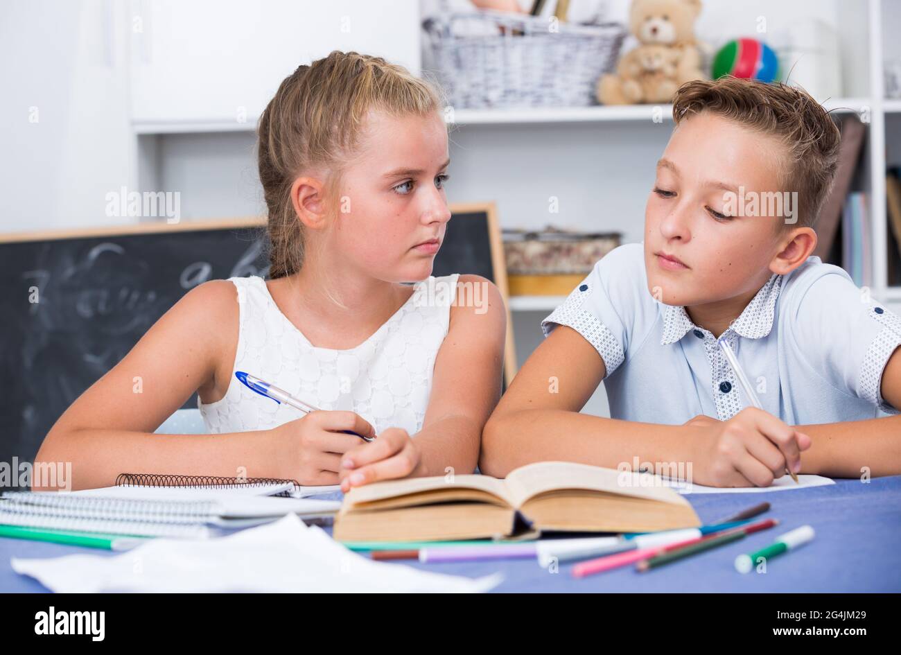 Friends Doing Math Homework Friends are learning new theme on math Stock Photo - Alamy