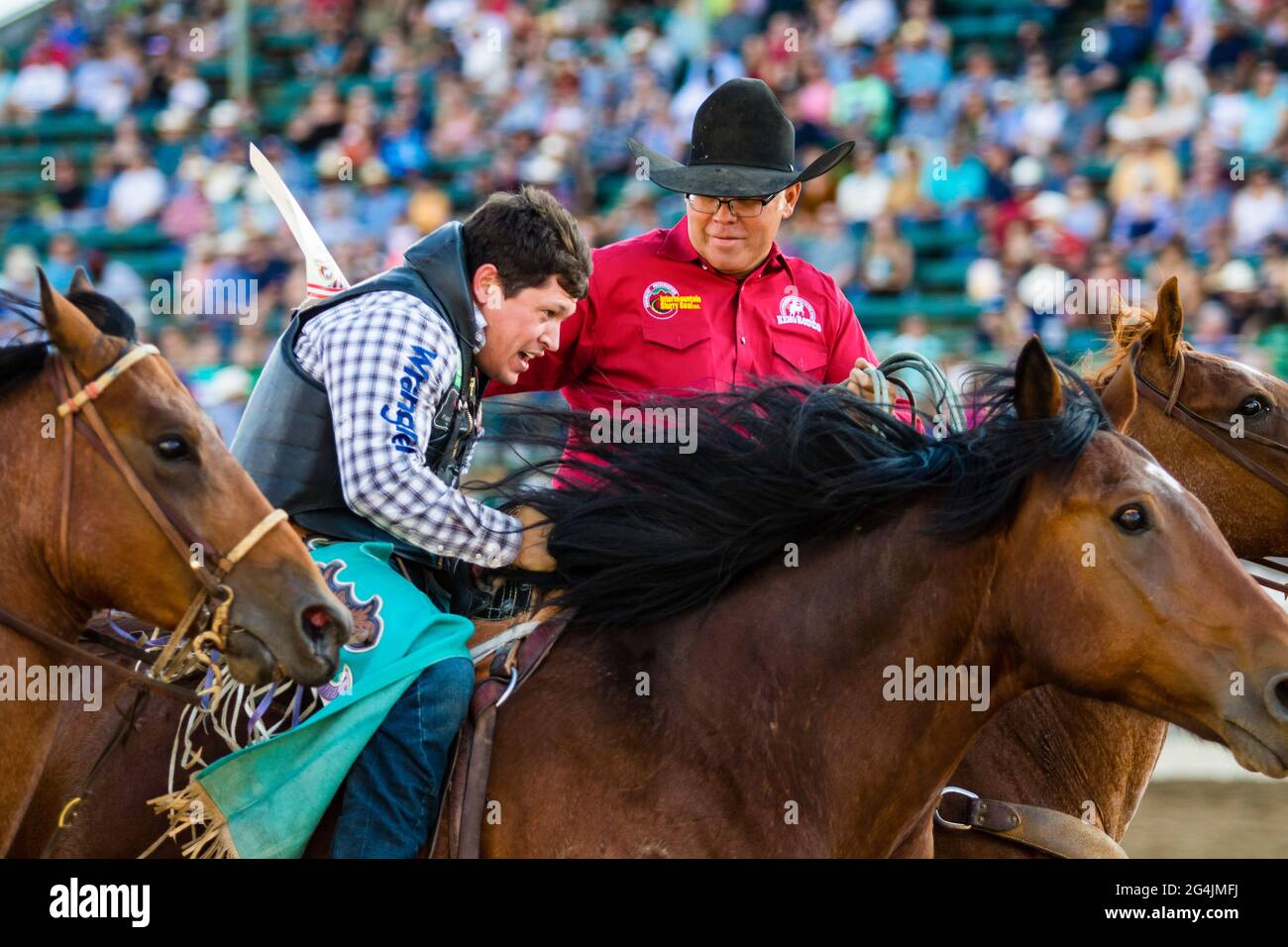 Reno, United States. 20th June, 2021. Pickup men help Tanner Aus to ...