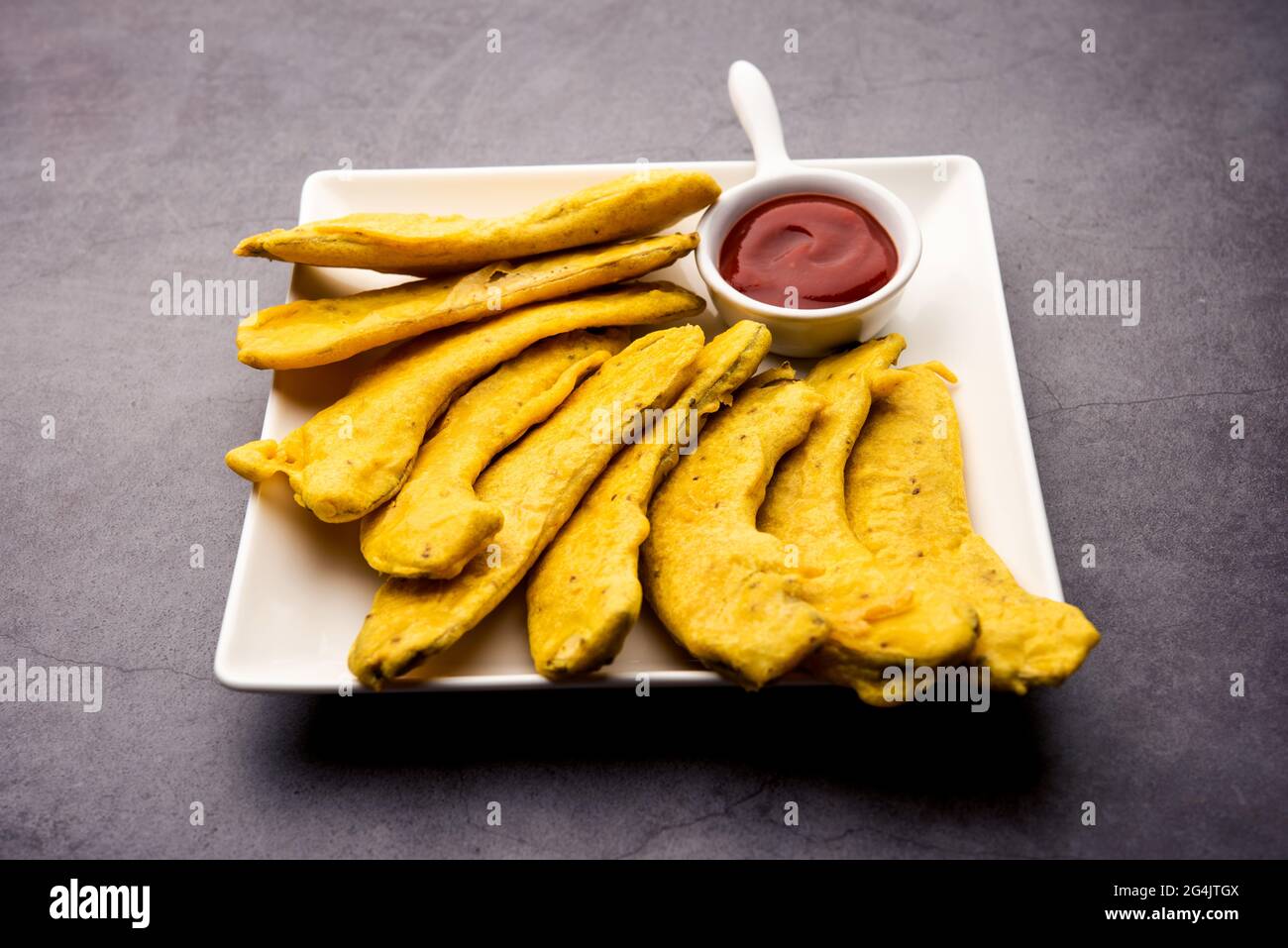 Banana Fritter or pakora or raw kela pakoda or bajji served with