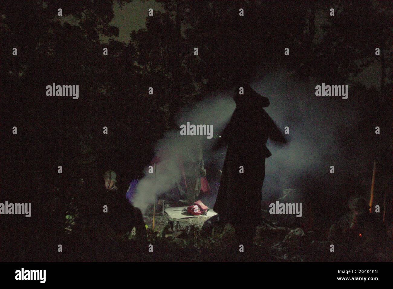 Mount Salak, West Java, Indonesia. May 11, 2012. Search and rescue personnels cooking while resting, during the search mission for the Sukhoi Superjet 100 (SSJ-100) plane that crashed in the region on May 9. Stock Photo