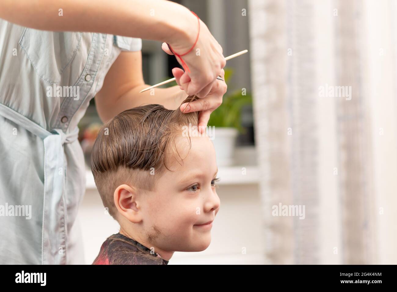Child cutting hair scissors hi-res stock photography and images - Page 2 -  Alamy