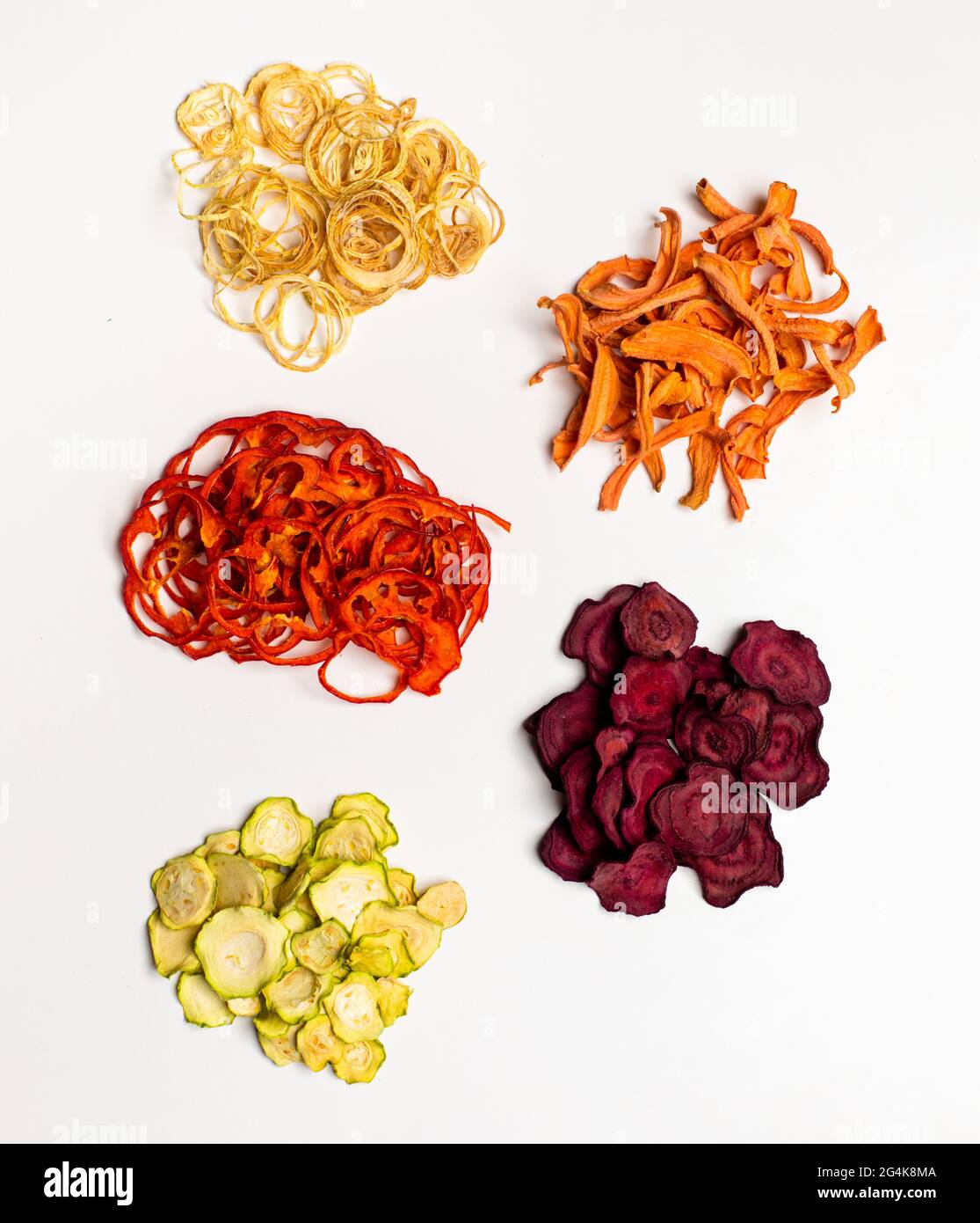 Dehydrated vegetables heap isolated on white as a snack for vegetarians Stock Photo Alamy
