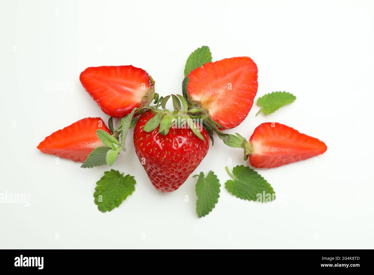 Fresh tasty strawberry with leaves on white background Stock Photo - Alamy