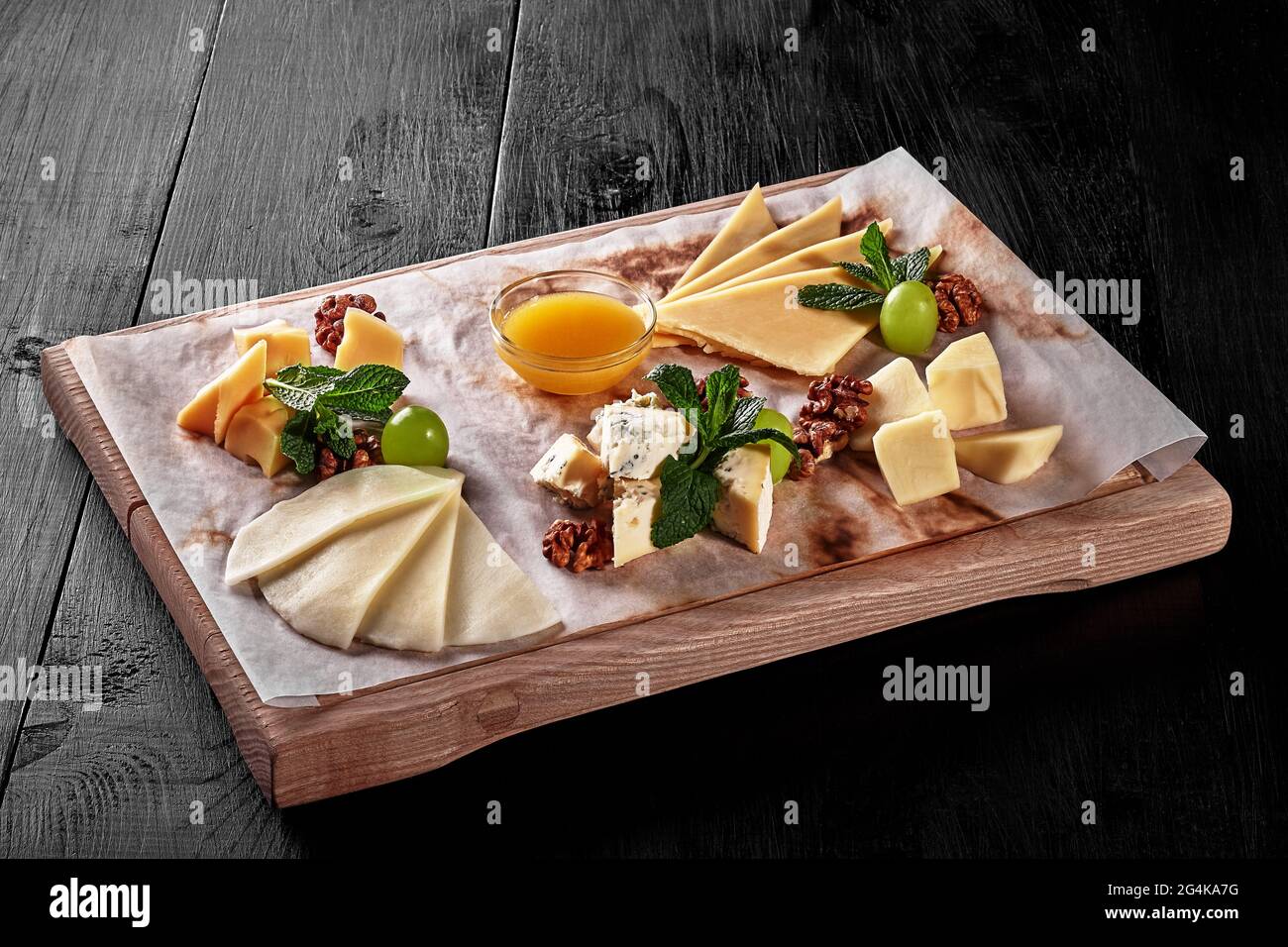 Platter with sulguni, mozzarella, dor blue and semi firm cheese Stock Photo