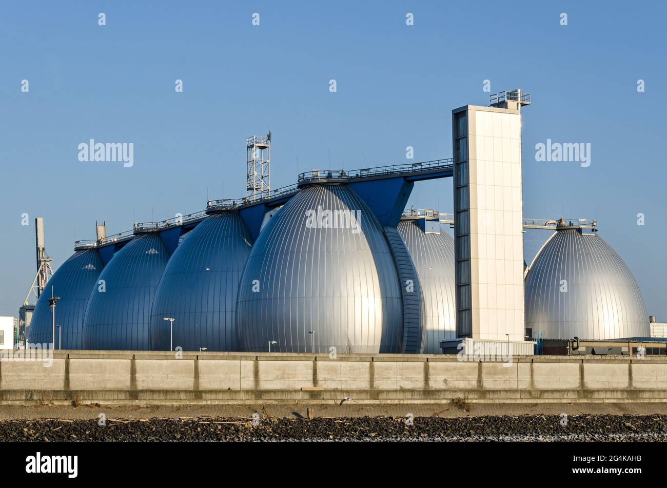 Gas storage tanks in the harbour area in Hamburg, Germany Stock Photo