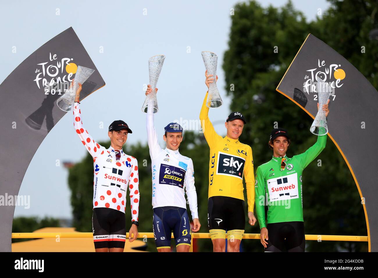 File photo dated 23-07-2017 of Team Sky's Chris Froome (second right) celebrates on the podium along with Youth winner Orica-Scott's Simon Yates (second left) after stage 21 of the 2017 Tour de France in Paris. Issue date: Tuesday June 22, 2021. Stock Photo