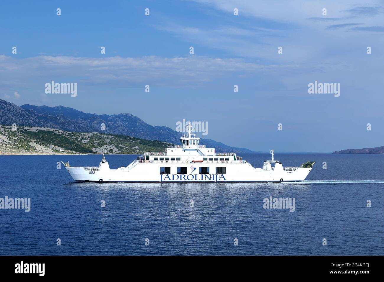 The ferry of the national Croatian shipping company Jadrolinija sails between the island and the mainland Stock Photo