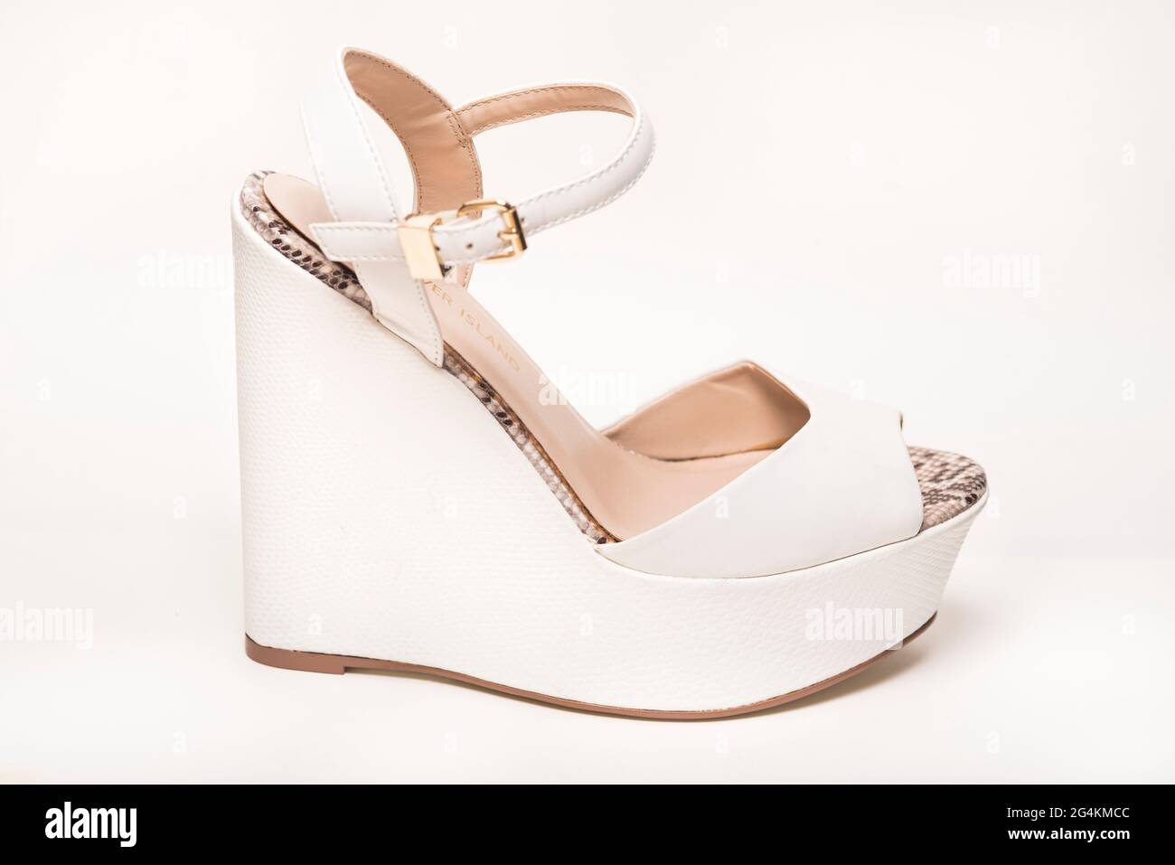 White wedge heels hi-res stock photography and images - Alamy