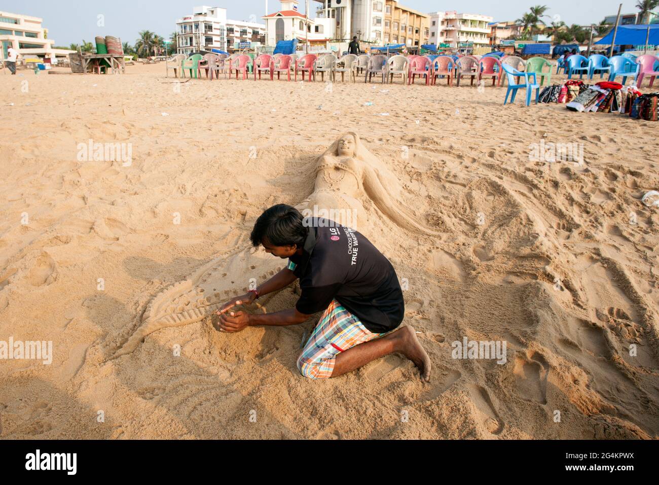 A local artist making sand art at Puri, Odisha, India, a popular