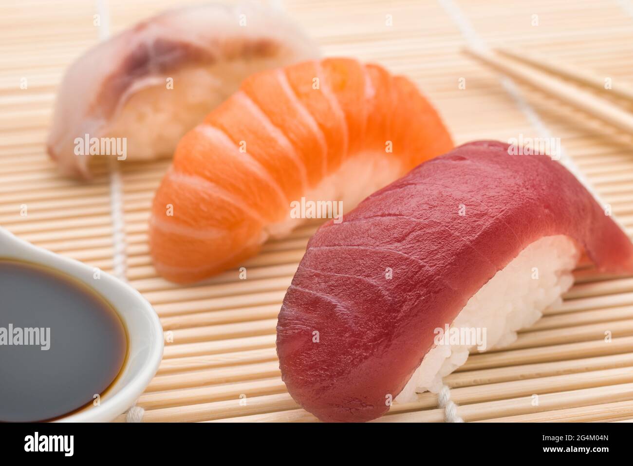 Sushi Nigiri tuna salmon and swordfish with soy sauce Stock Photo Alamy