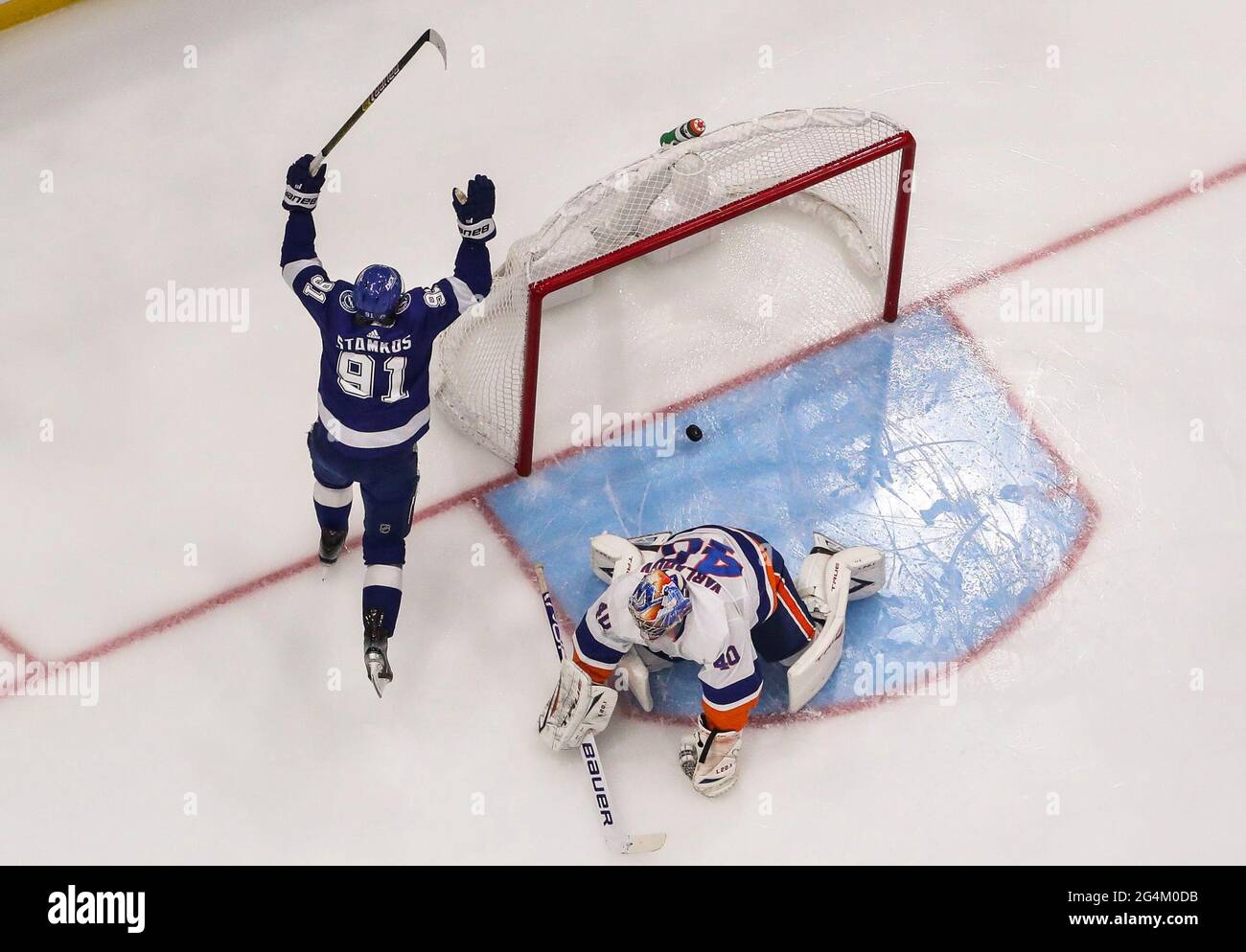 Tampa Bay Lightning center Steven Stamkos (91) celebrates his game-winning  goal in overtime of an NHL hockey game against the Washington Capitals,  Saturday, Oct. 16, 2021, in Washington. The Lightning won 2-1. (