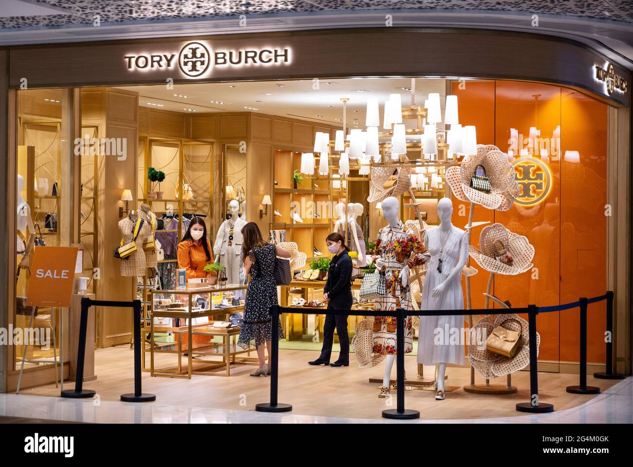 Shoppers seen at the American fashion brand Tory Burch store in Hong Kong.  (Photo by Budrul Chukrut / SOPA Images/Sipa USA Stock Photo - Alamy