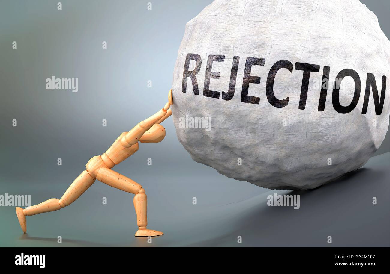 Rejection and painful human condition, pictured as a wooden human figure pushing heavy weight to show how hard it can be to deal with Rejection in hum Stock Photo