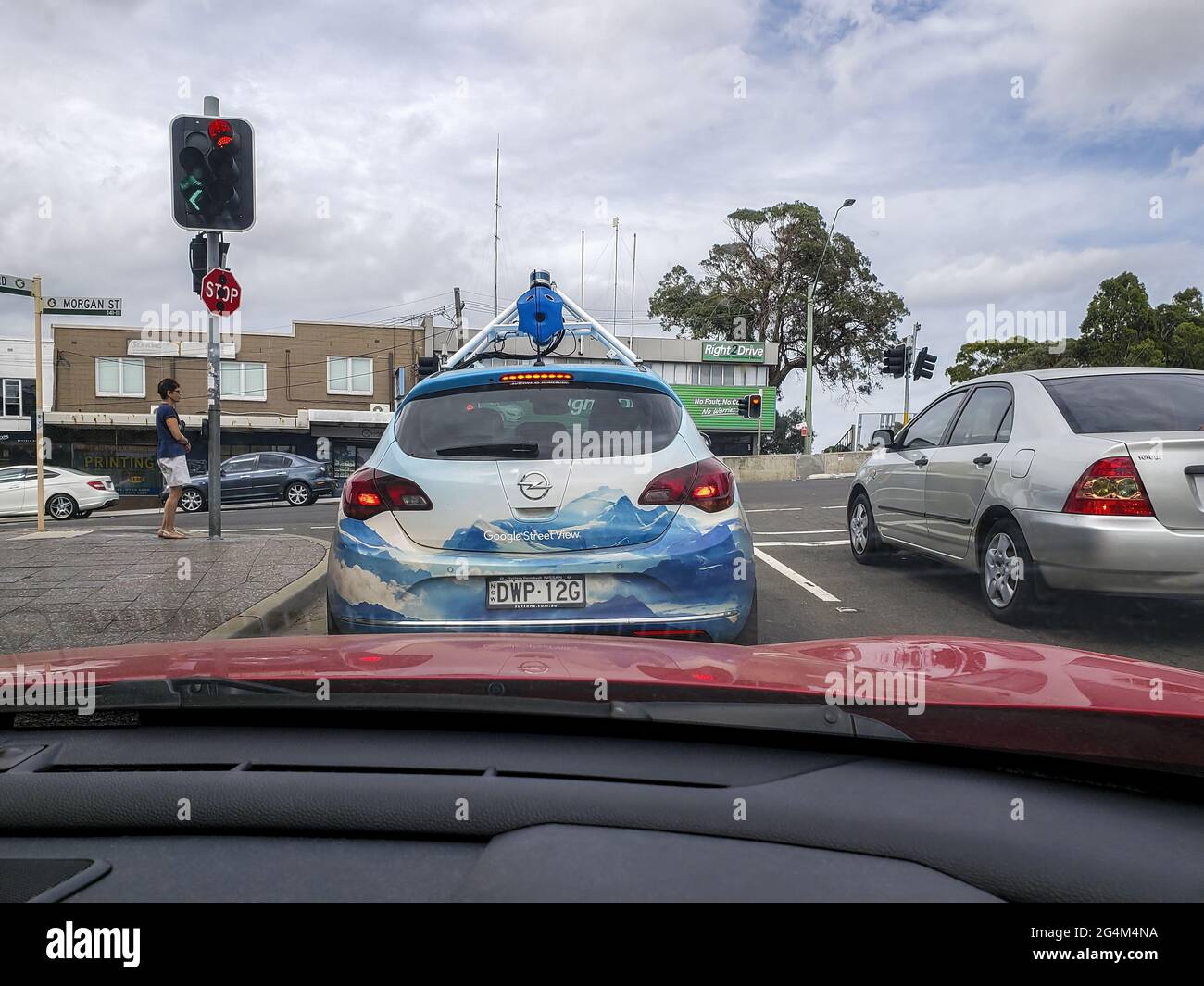 SYDNEY, AUSTRALIA - Jan 19, 2019: Google Street View car equipped with overhead 360 degrees camera stopped at traffic lights; intersection of King Geo Stock Photo