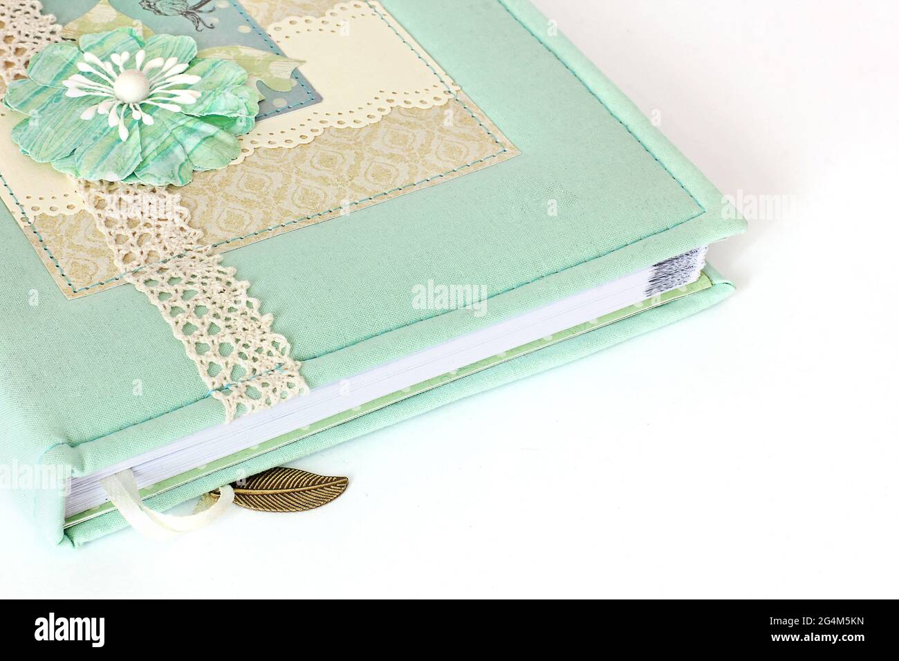 Handmade notepad. Beautiful notebook on white background Stock Photo