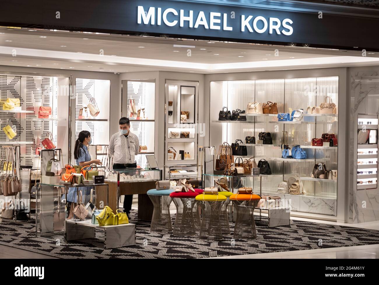 American clothing fashion store brand Michael Kors (MK) logo seen in ...