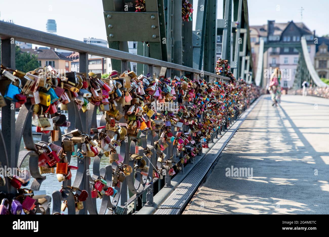 Love locks on the Eiserner Steg in Frankfurt am Main with a view towards Sachsenhausen Stock Photo