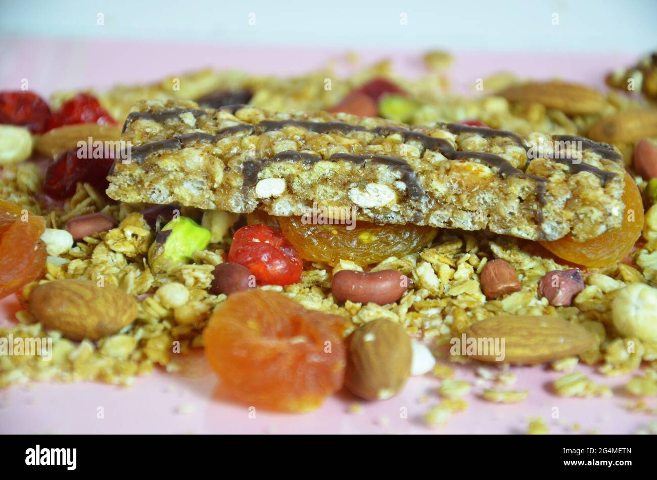 Granola bars, muesli bars or energy bars with oats, dates and nuts on