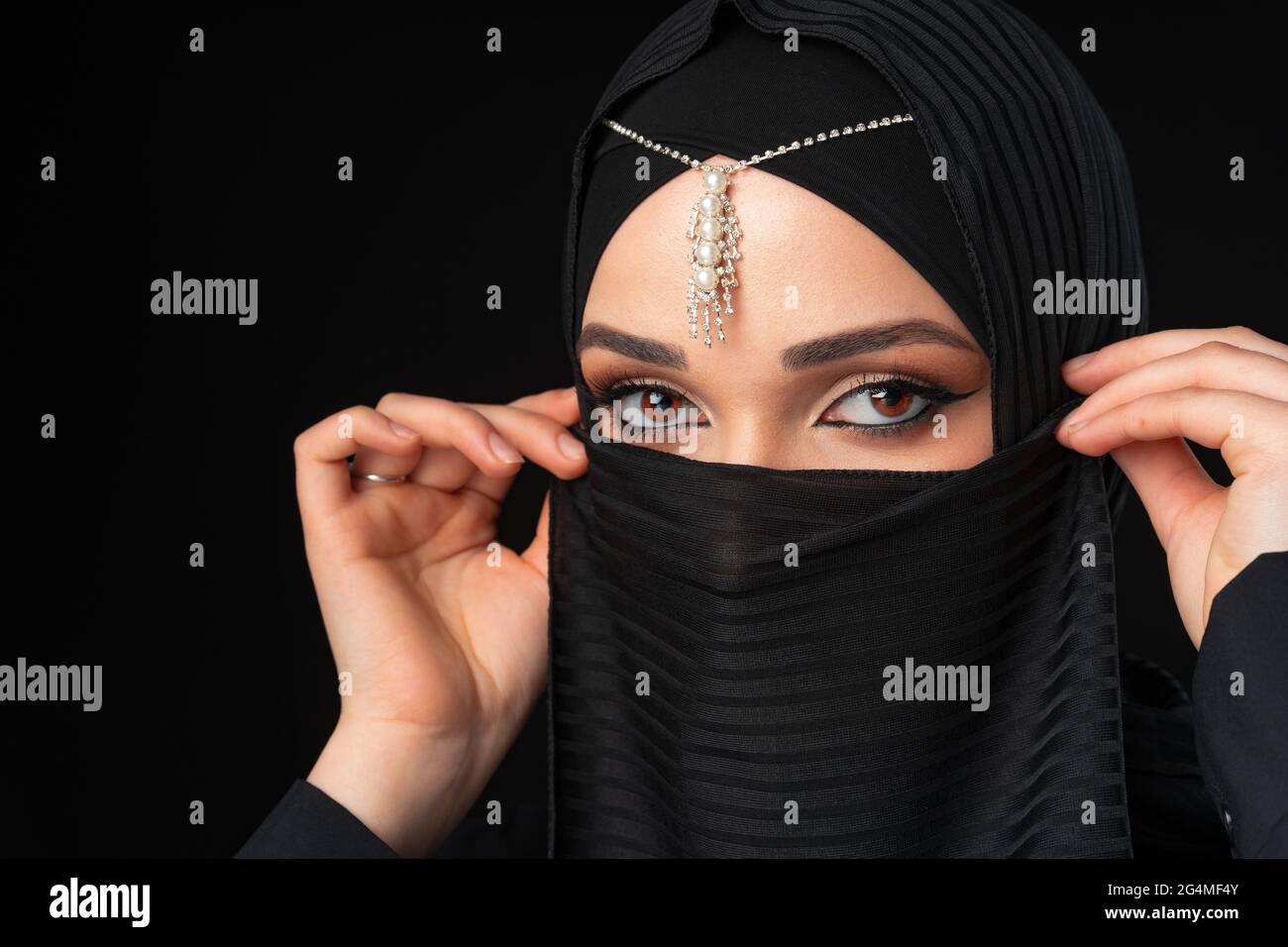 Close up portrait of beautiful muslim girl dressed in hijab Stock Photo ...