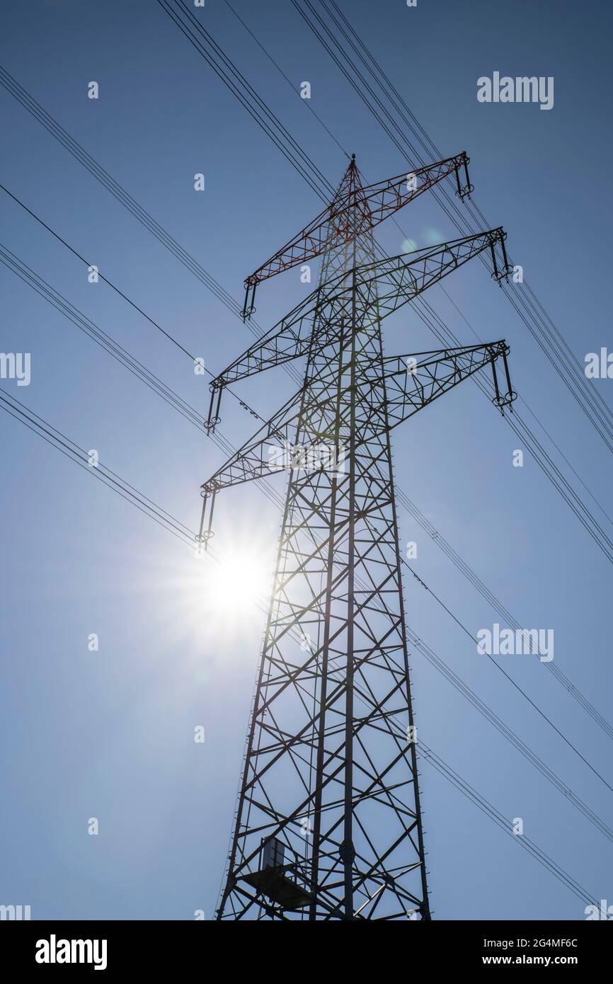 Power pylon and the sun Stock Photo