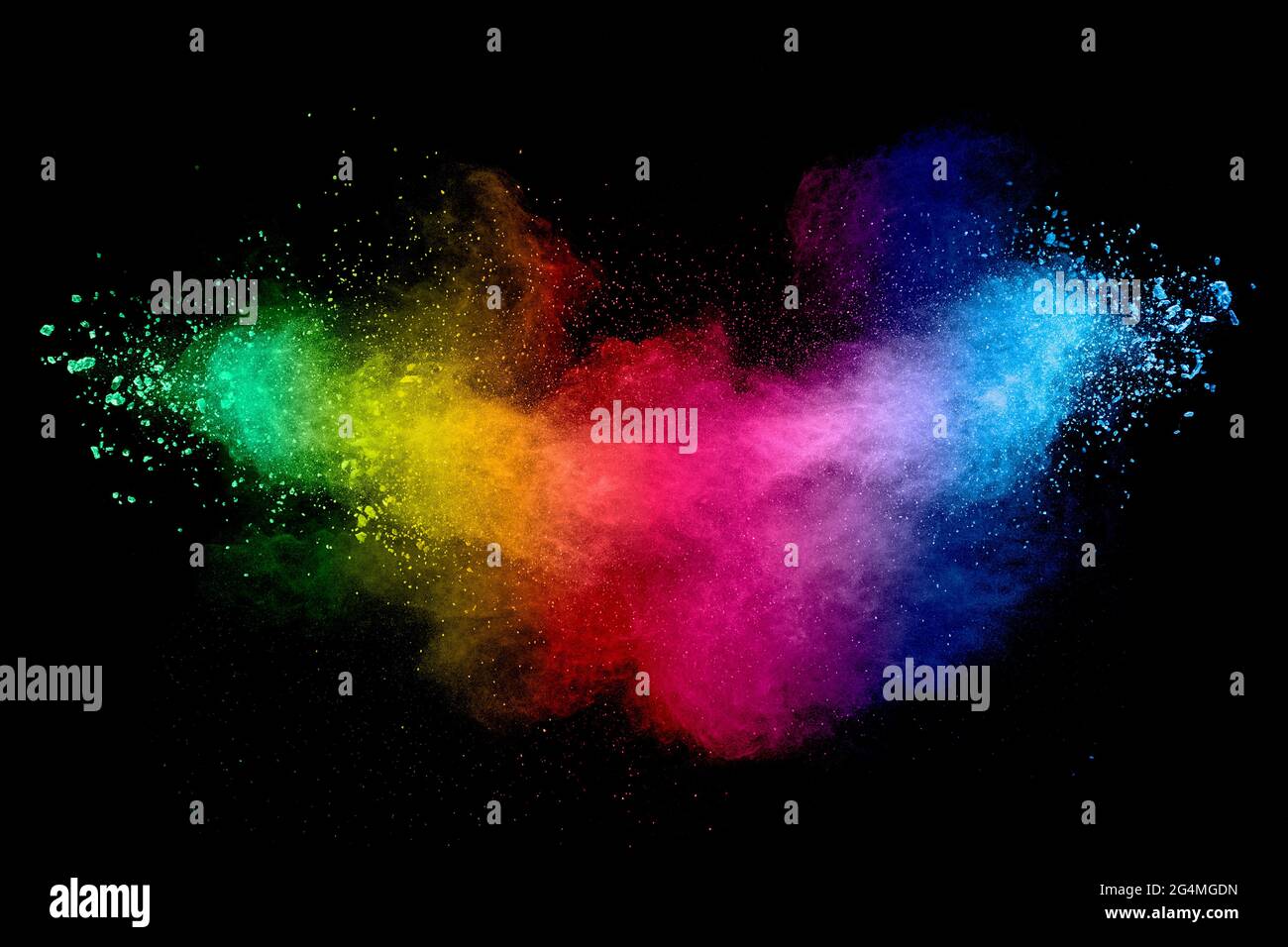 Colorful background of pastel powder explosion.Rainbow color dust splash on black background. Stock Photo