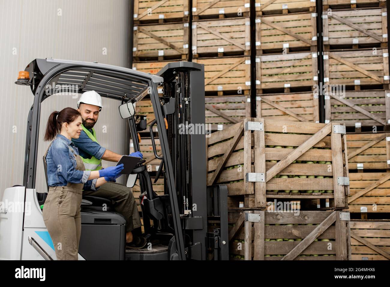 Management of loading products, modern device and checking driver work in warehouse Stock Photo