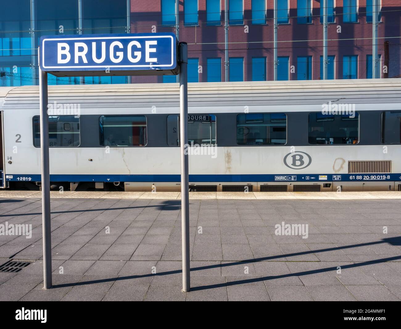 Brugge train station under clear blue sky in Belgium Stock Photo - Alamy